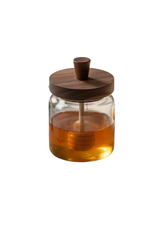 Glazen honingpot
